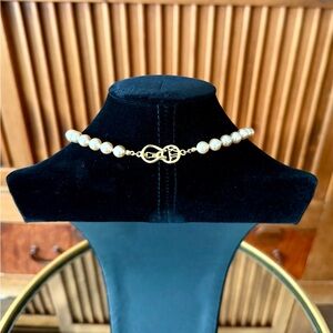 By the master of faux jewelry, Kenneth Jay Lane - PEARLS w/ signature clasp.
